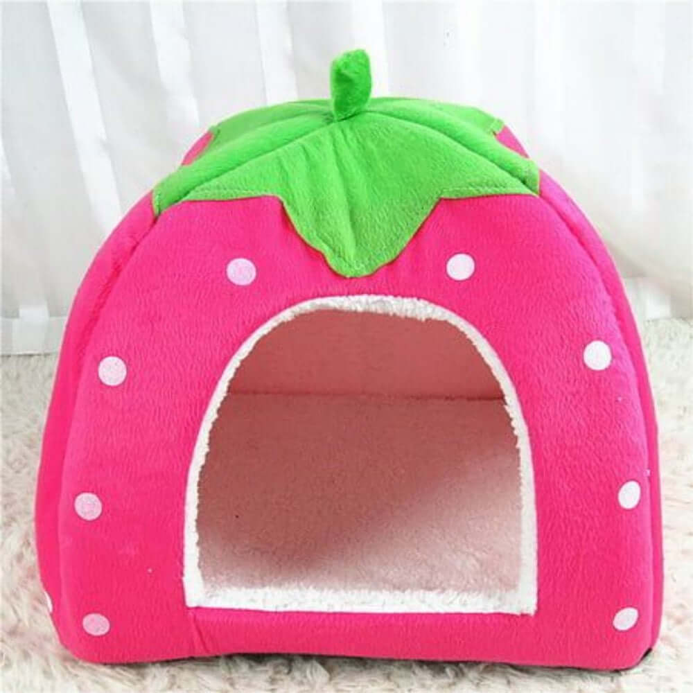Soft Cat Beds with Adorable Designs – Spoil Your Fur Baby in a pink strawberry-shaped cat bed.